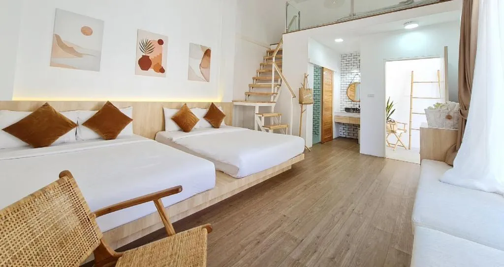 Bed in Sawasdee Coco Resort