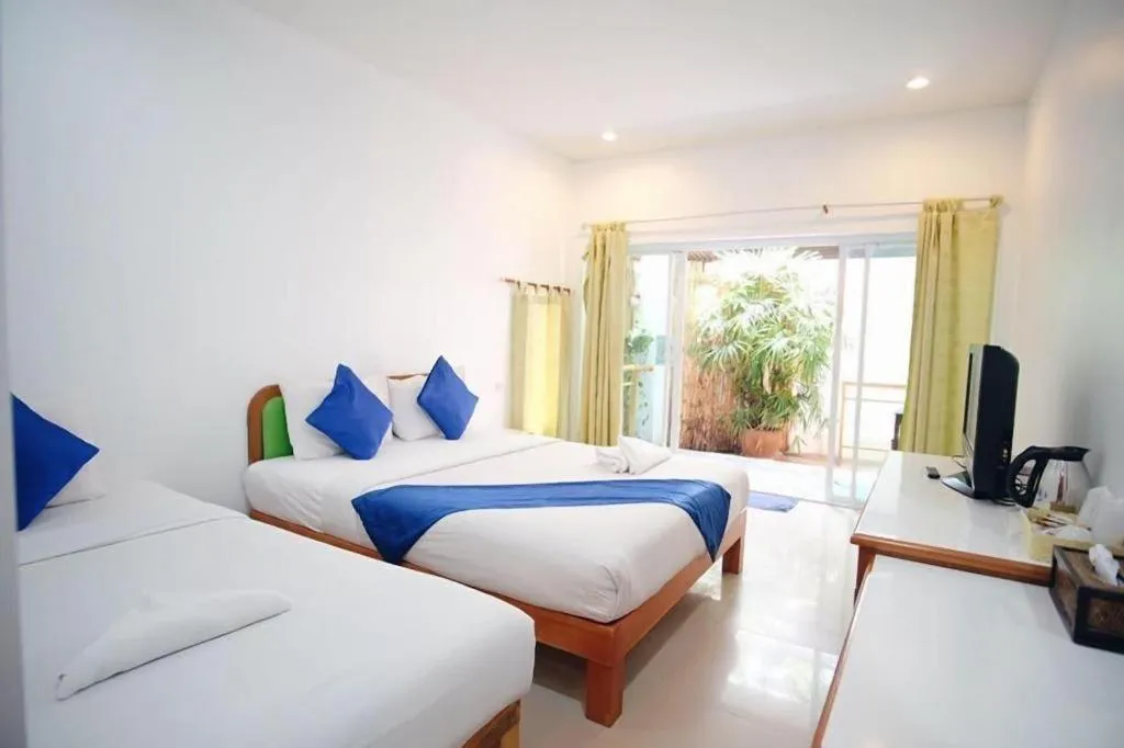 Bed in Sawasdee Coco Resort