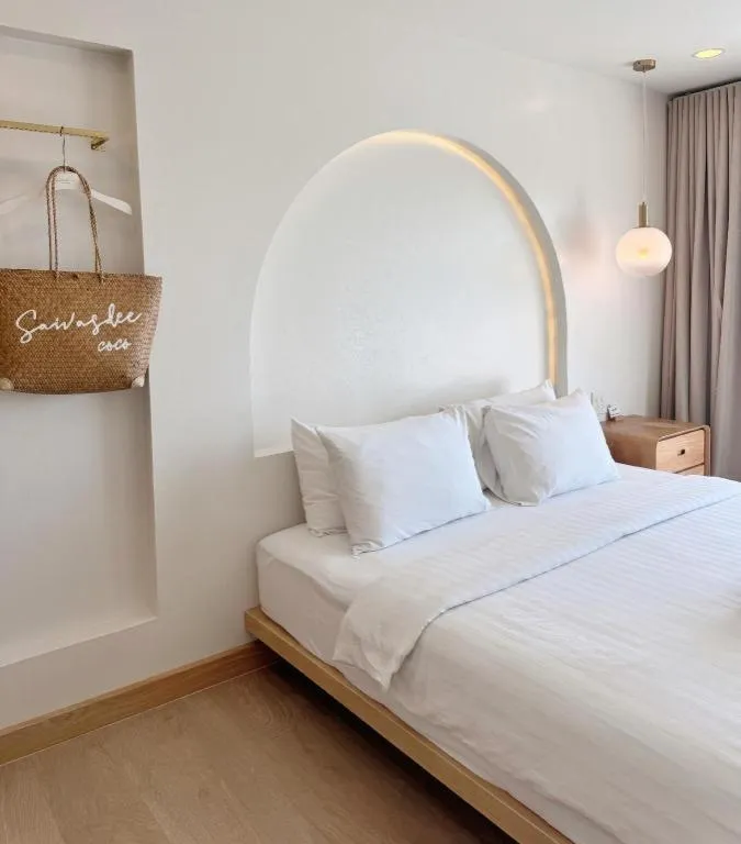 Bed in Sawasdee Coco Resort