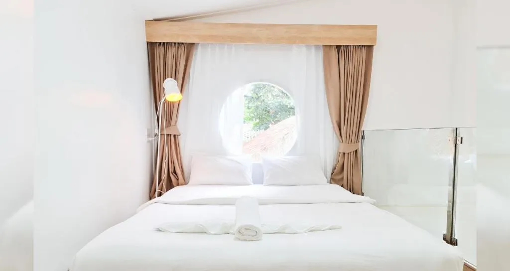 Bed in Sawasdee Coco Resort