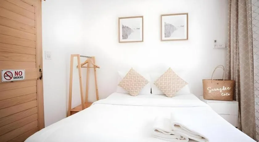 Bed in Sawasdee Coco Resort