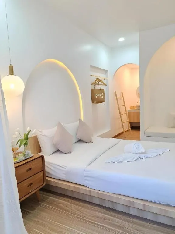 Bed in Sawasdee Coco Resort