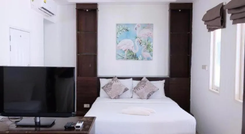 Bed in Sawasdee Coco Resort