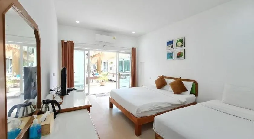 Bed in Sawasdee Coco Resort