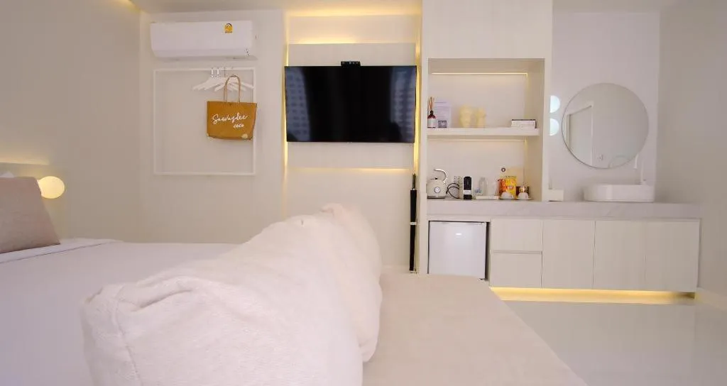 Bed in Sawasdee Coco Resort