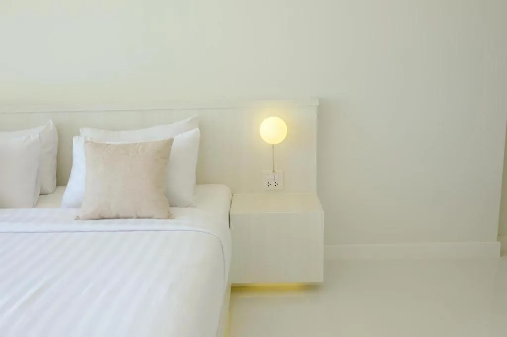 Bed in Sawasdee Coco Resort