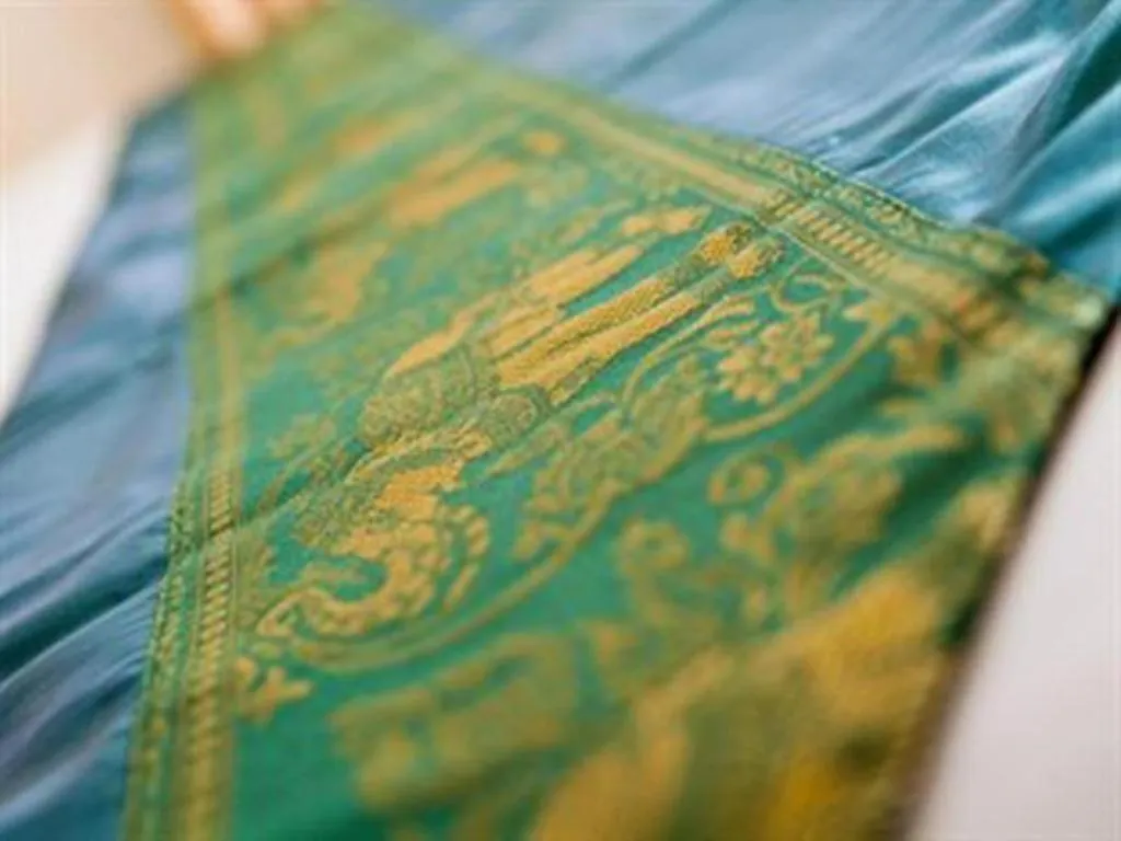 Bed in Triple Rund Place Hotel