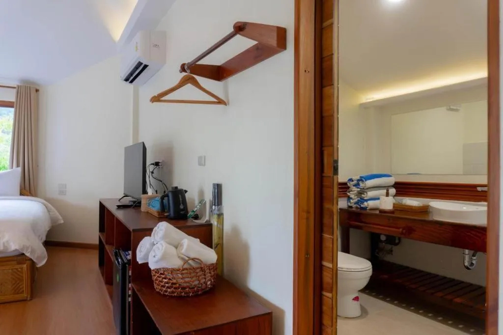 Bed in Anavilla Tangke Resort