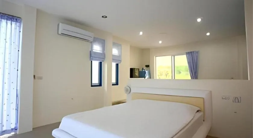 Bed in Anavilla Tangke Resort