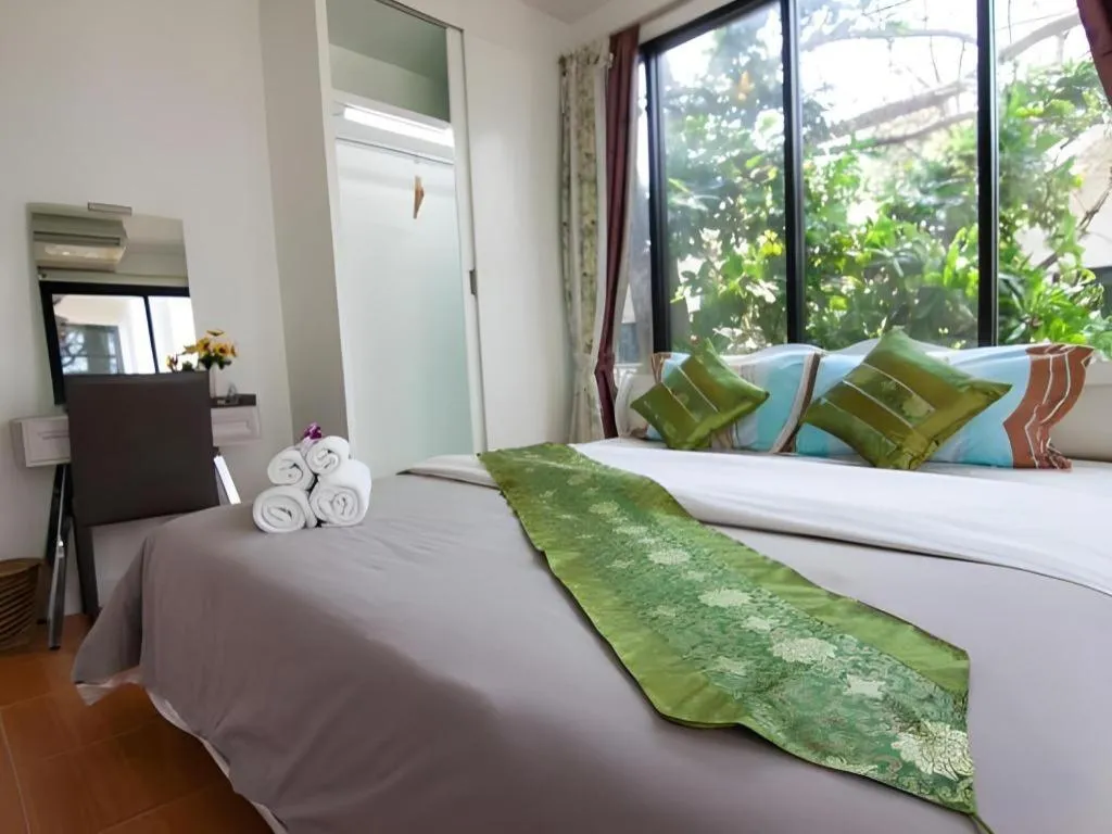 Bed in Chayada Garden House and Resort Hotel
