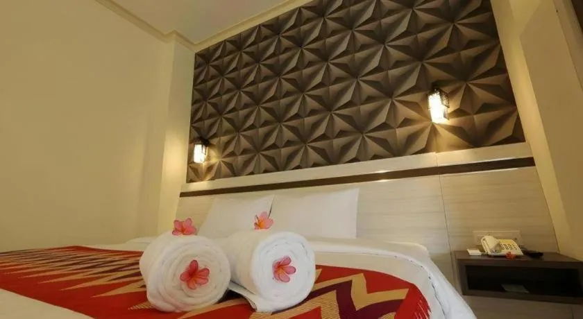 Bed in Puri Indah Hotel