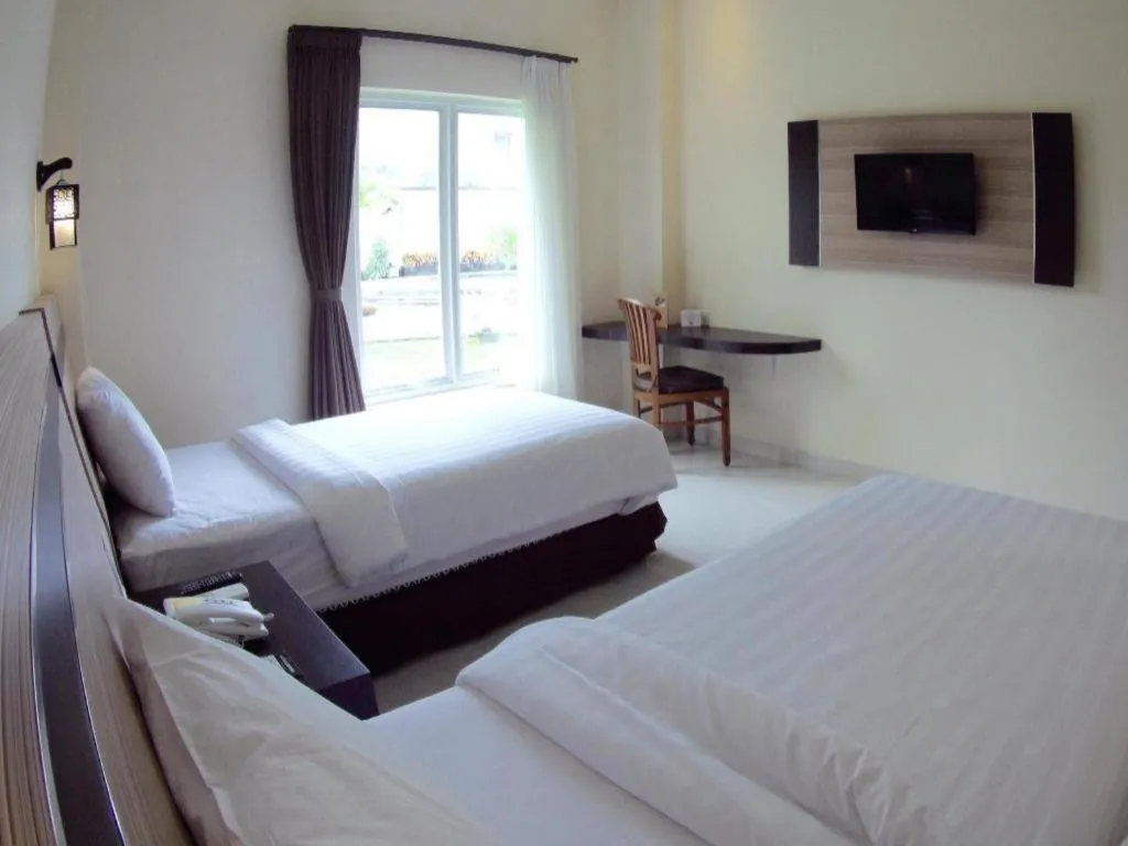 Bed in Puri Indah Hotel