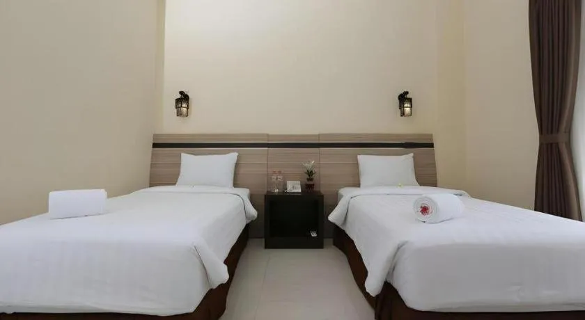 Bed in Puri Indah Hotel