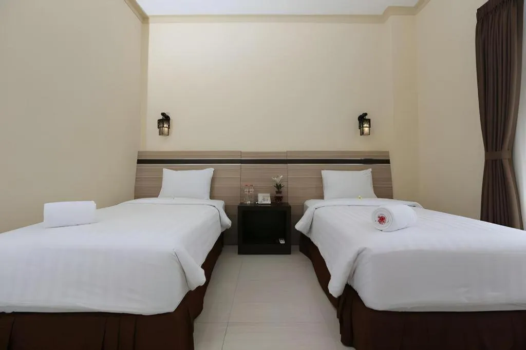 Bed in Puri Indah Hotel