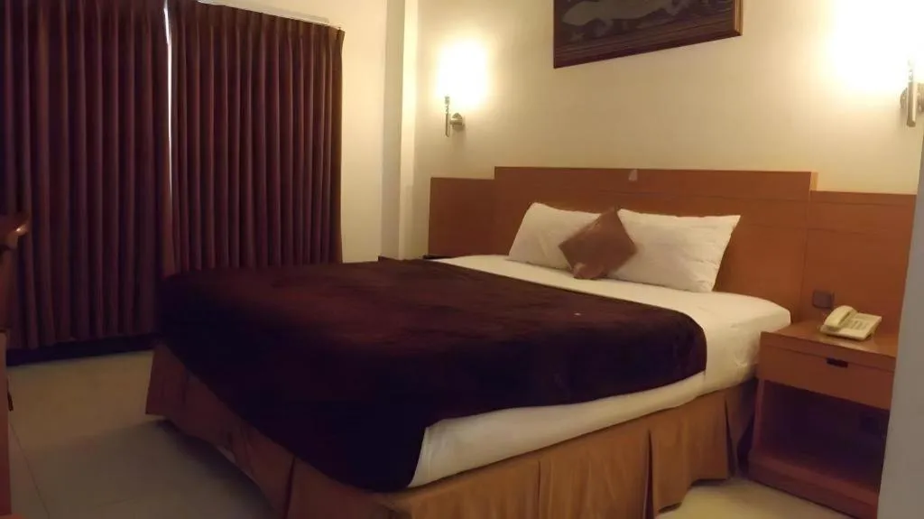 Bed in Puri Indah Hotel