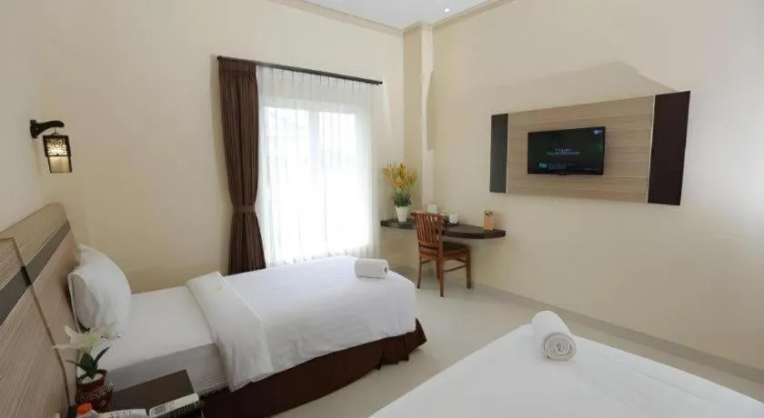 Bed in Puri Indah Hotel