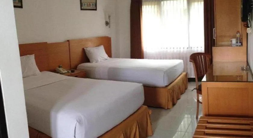 Bed in Puri Indah Hotel