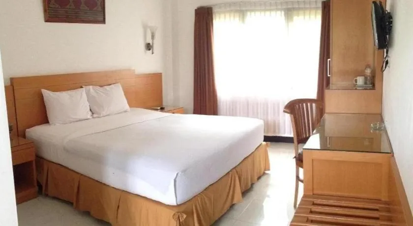 Bed in Puri Indah Hotel