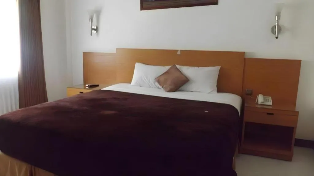 Bed in Puri Indah Hotel