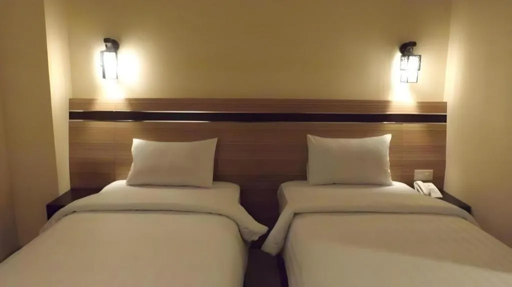 Bed in Puri Indah Hotel