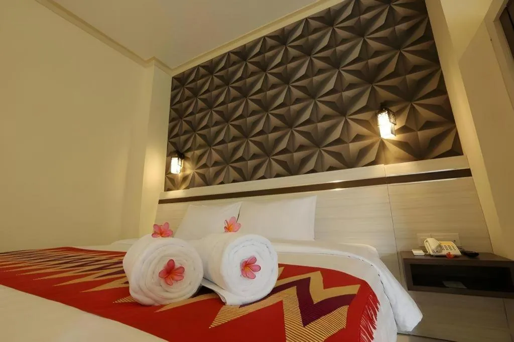 Bed in Puri Indah Hotel