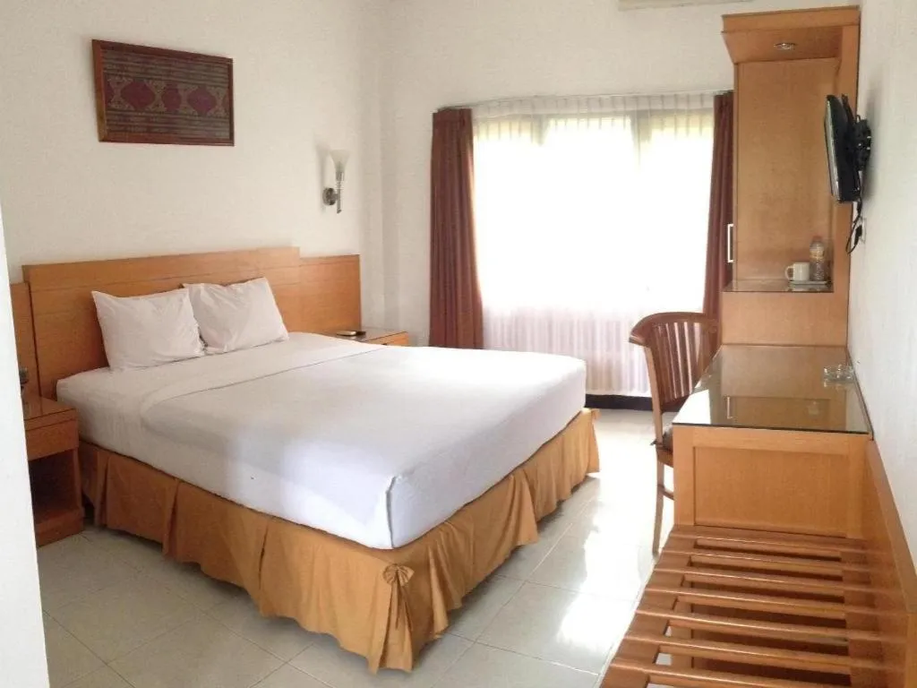 Bed in Puri Indah Hotel