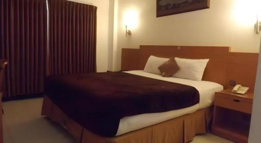 Bed in Puri Indah Hotel