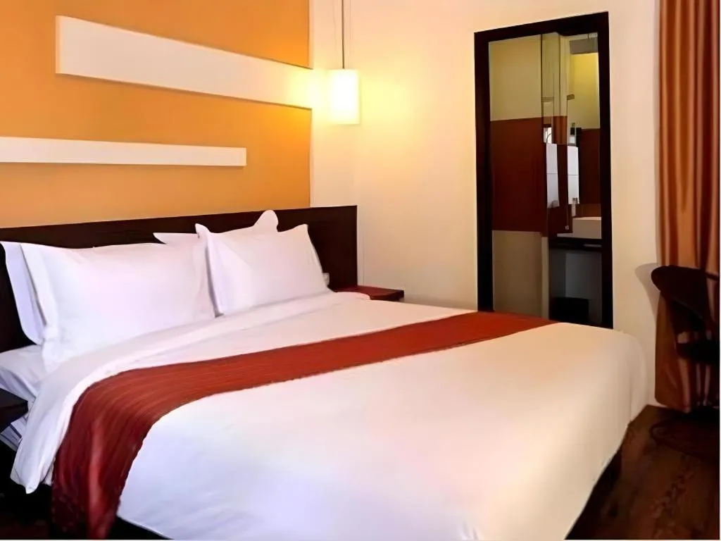 Bed in Savali Hotel