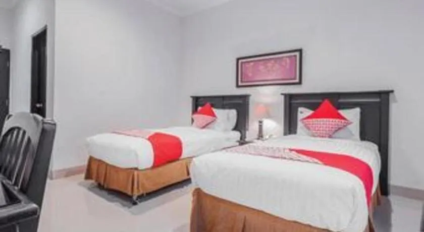 Bed in Sriwijaya Hotel