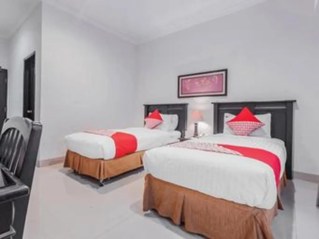 Bed in Sriwijaya Hotel