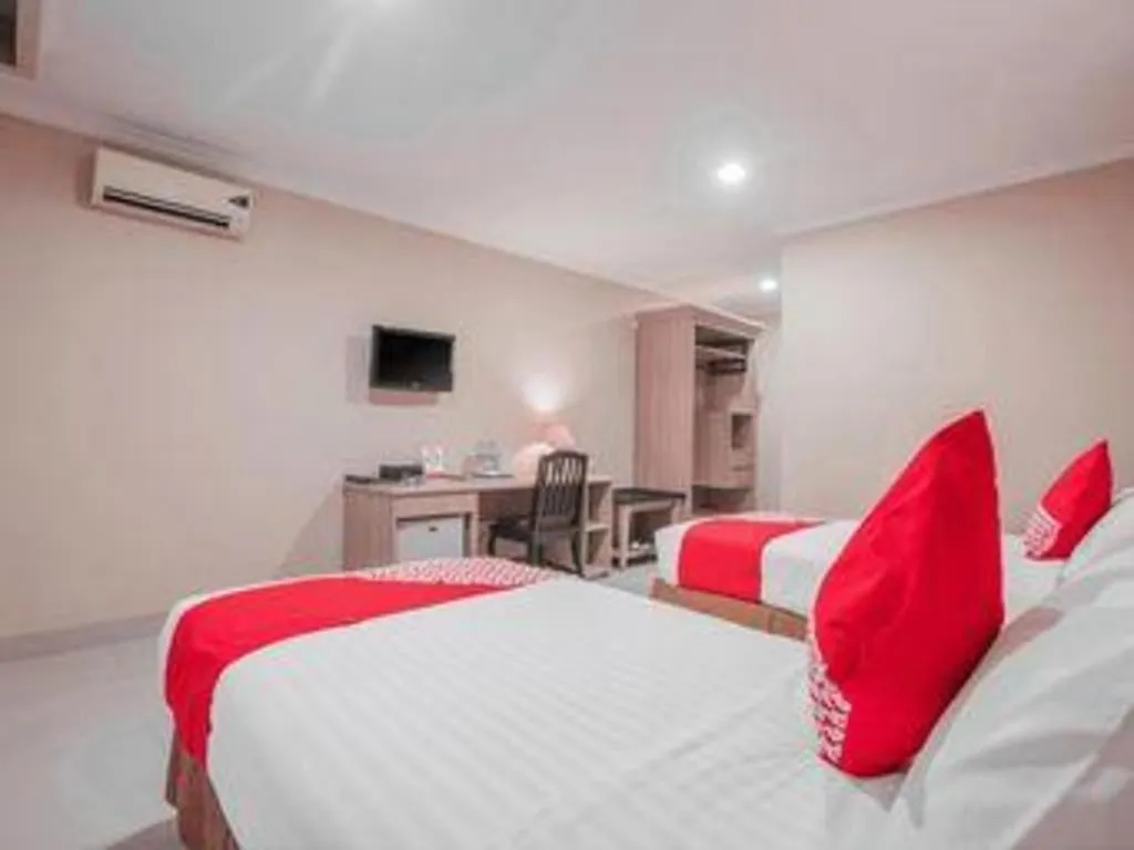 Bed in Sriwijaya Hotel