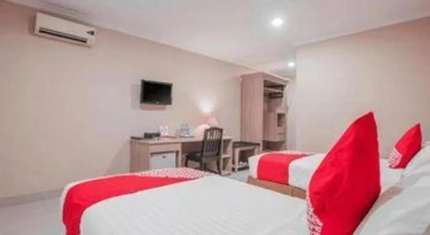 Bed in Sriwijaya Hotel