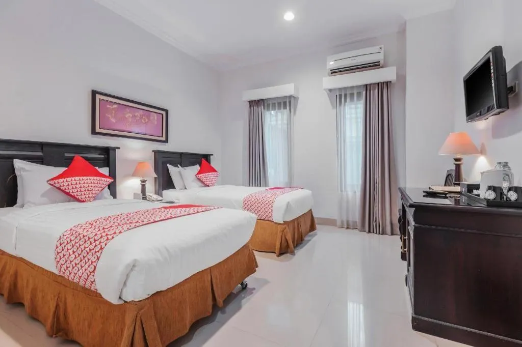 Bed in Sriwijaya Hotel