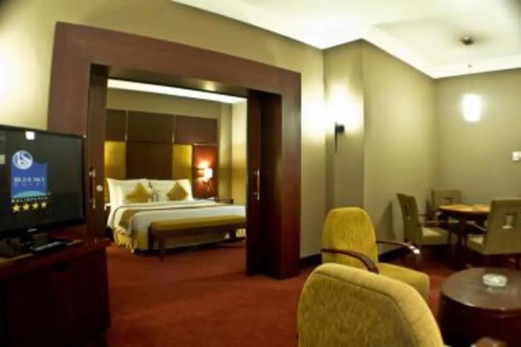 Bed in Blue Sky Hotel