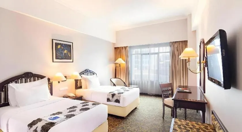 Bed in Blue Sky Hotel