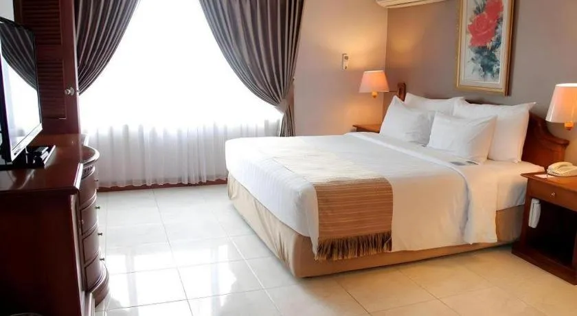 Bed in Blue Sky Hotel