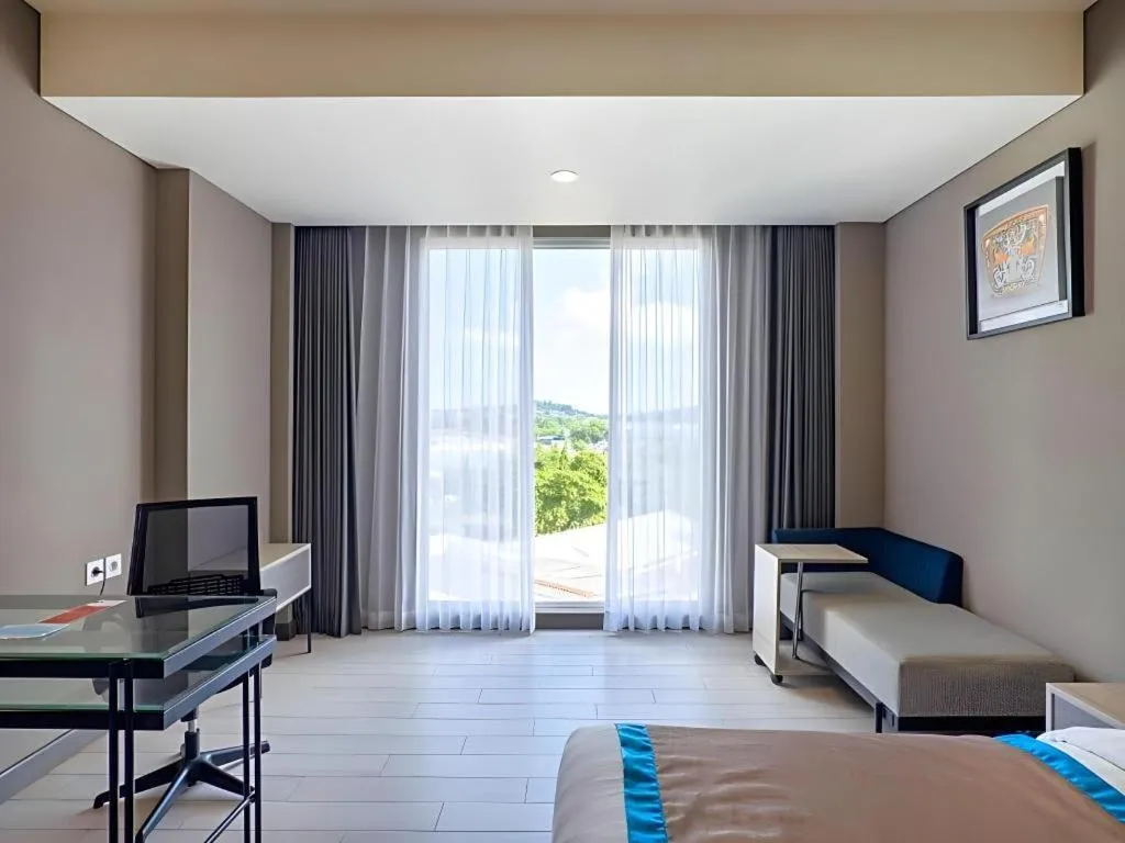 Bed in Blue Sky Hotel