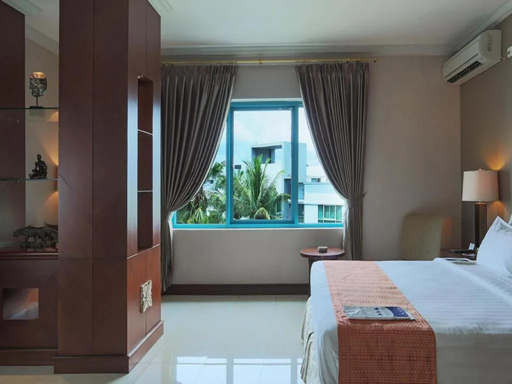 Bed in Blue Sky Hotel