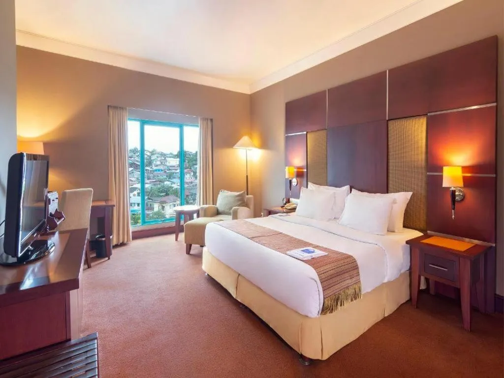 Bed in Blue Sky Hotel