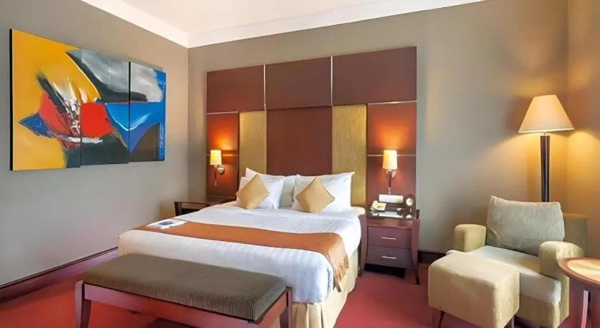 Bed in Blue Sky Hotel