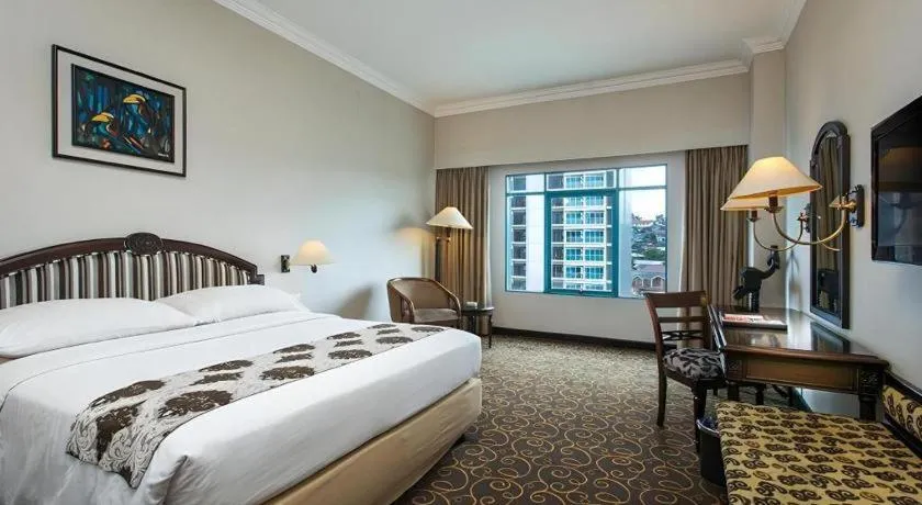 Bed in Blue Sky Hotel