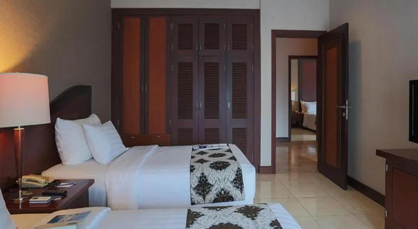 Bed in Blue Sky Hotel