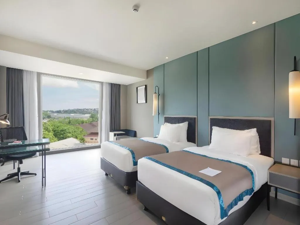 Bed in Blue Sky Hotel