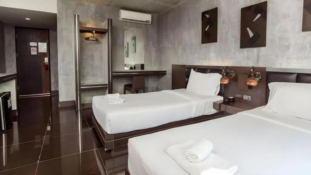 Bed in B2 Black Business and Budget Hotel