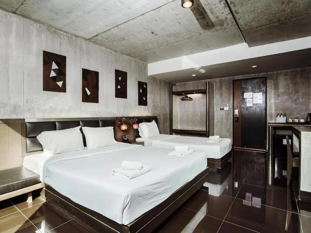 Bed in B2 Black Business and Budget Hotel