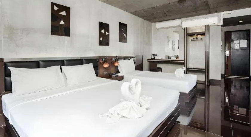 Bed in B2 Black Business and Budget Hotel