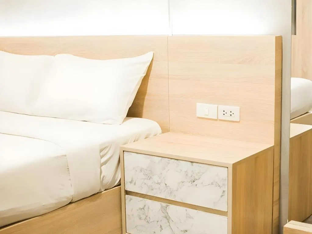 Bed in B2 Santitham Boutique & Budget Hotel