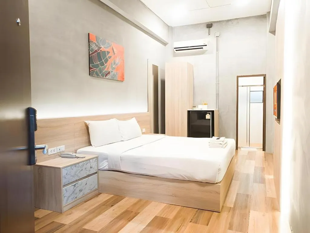 Bed in B2 Santitham Boutique & Budget Hotel