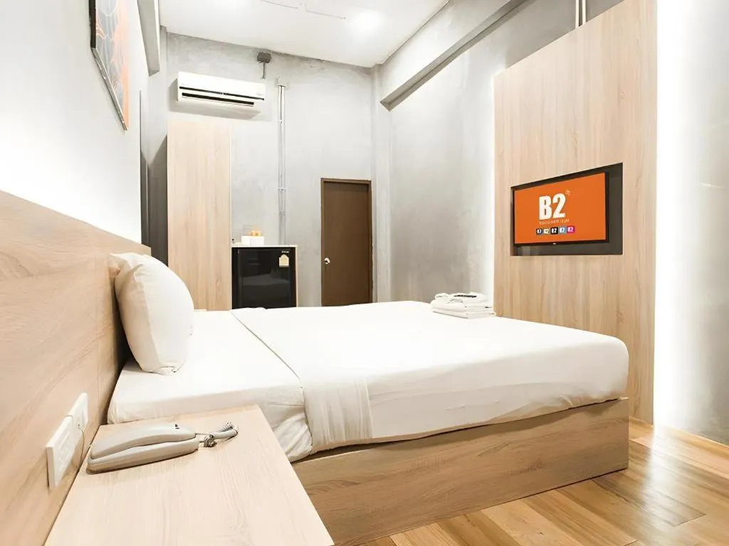 Bed in B2 Santitham Boutique & Budget Hotel
