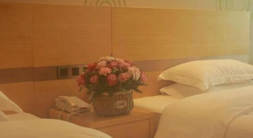 Bed in GreenTree Inn Suites HongQiao Airport Branch